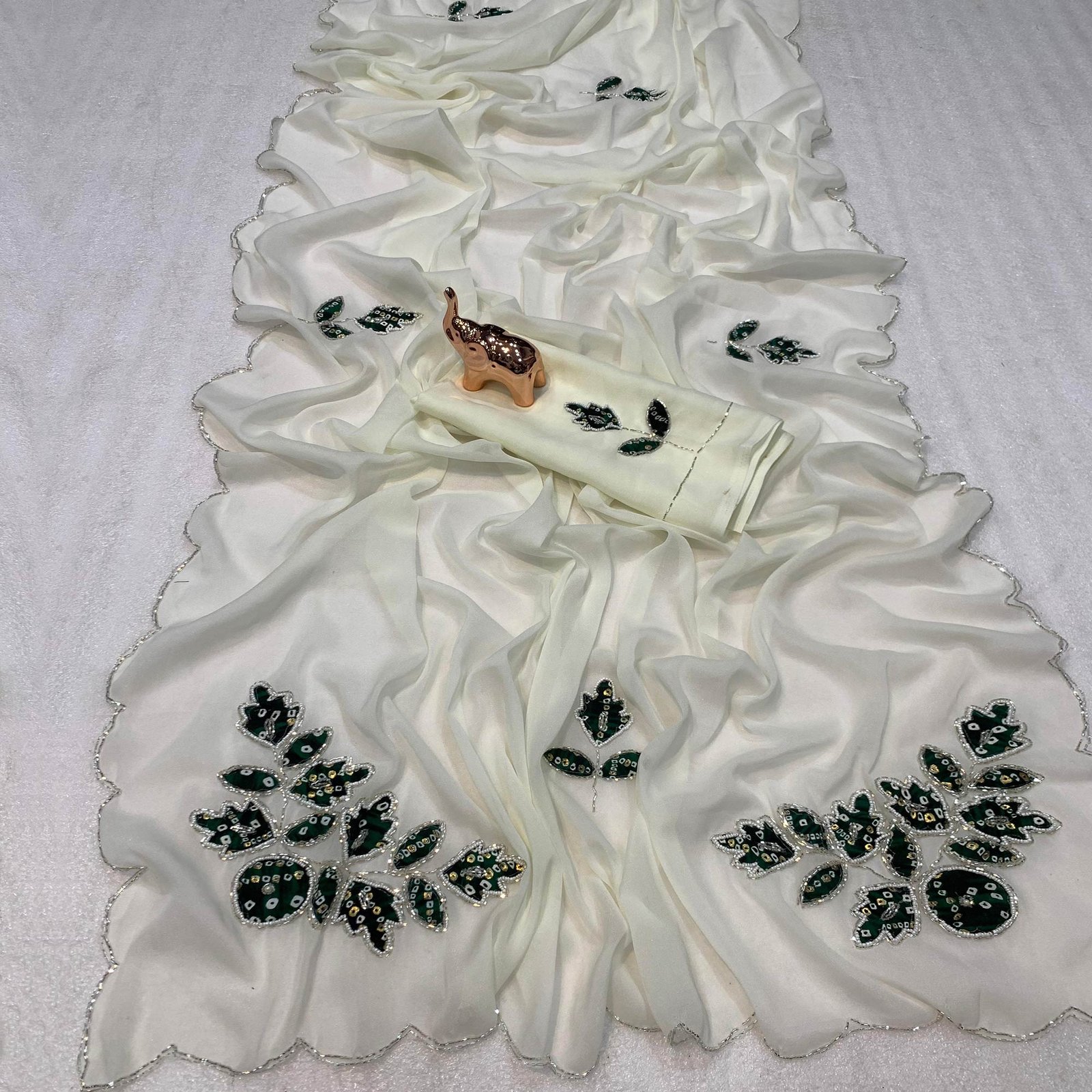 White & Green Partywear Georgette Saree with Delicate Stone & Bead Work