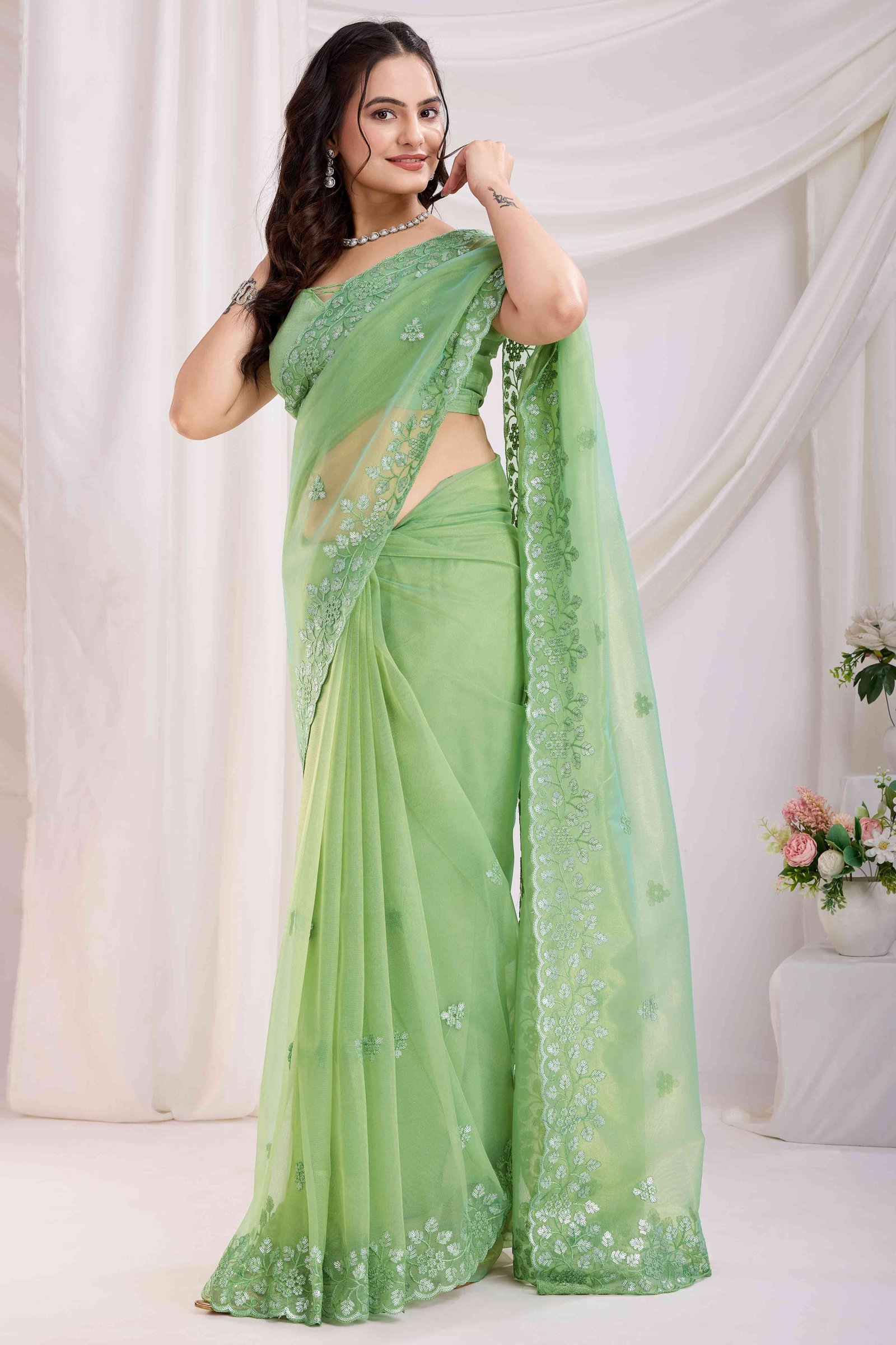 Green Floral Sequins Embroidered Twill Net Saree