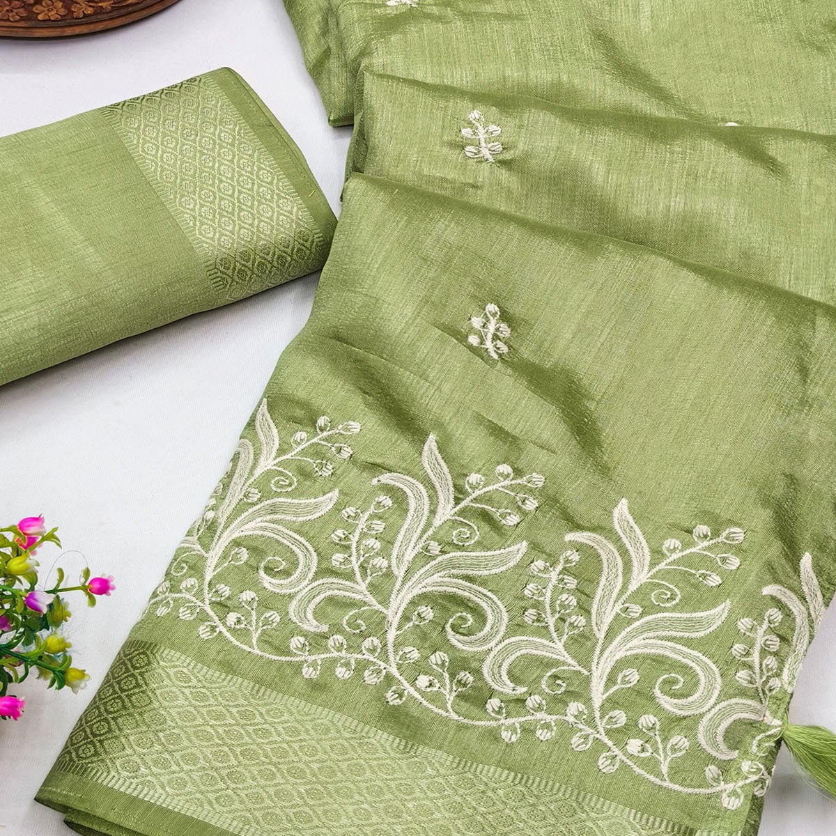 Green Art Silk Saree Adorned With Delicate Floral Embroidery & Stylish Tassel Pallu - Image 2